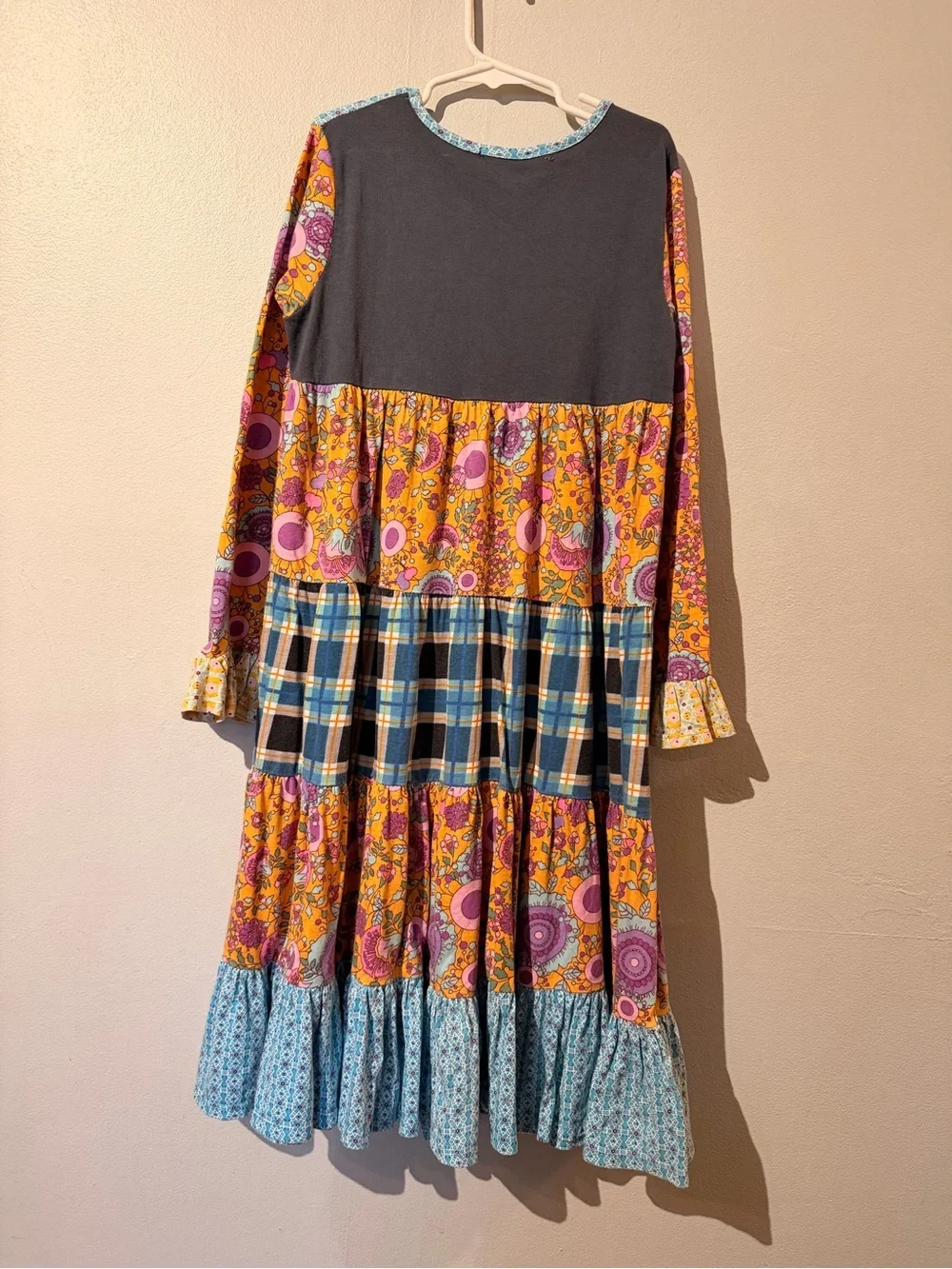 Jelly The Pug Blue, Yellow & Pink Multi-Pattern Tiered Dress with Pink Rosette